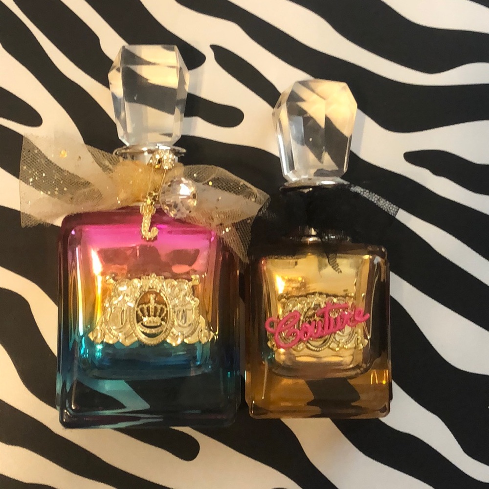 Two used empty bottles of Viva La Juicy.